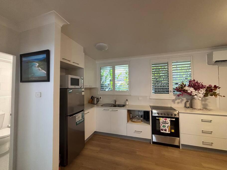 Apartamento Tropical Ground-floor Retreat
