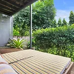 Modern Meets Tropical In This Free-Standing Home