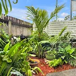 Modern Meets Tropical In This Free-Standing Home